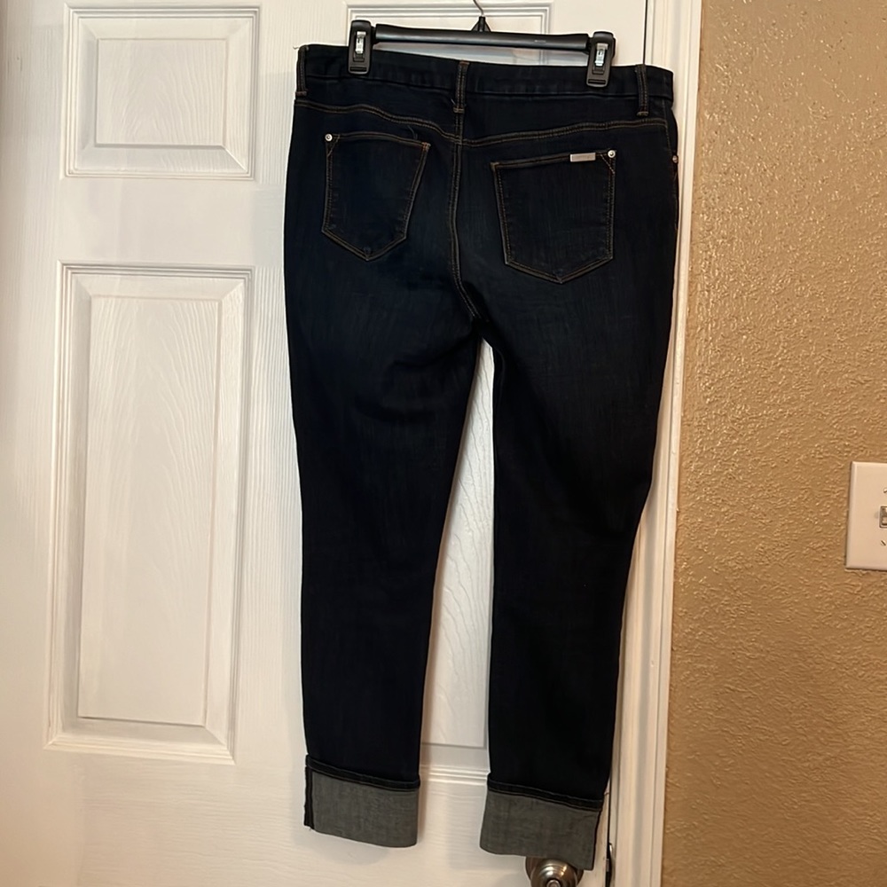 Chico’s size 0.5, blue denim So Slimming Ankle length jeans.  Sewn Cuff detail